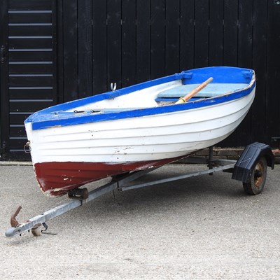 Lot 407 - A rowing boat with trailer