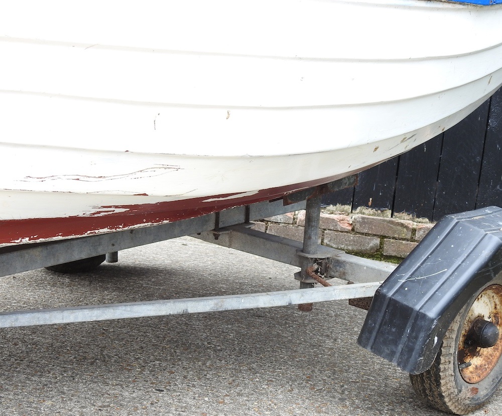 Lot 407 - A rowing boat with trailer