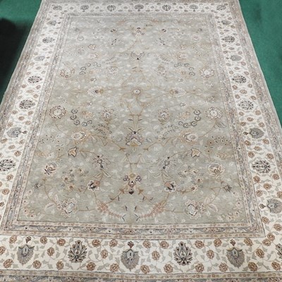 Lot 662 - A Chinese woollen carpet