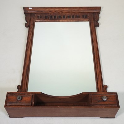 Lot 560 - An early 20th century mirror