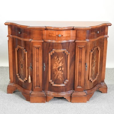 Lot 607 - An Italian reproduction serpentine credenza