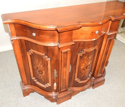 Lot 607 - An Italian reproduction serpentine credenza