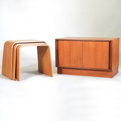 Lot 908 - A nest of tables and a cabinet