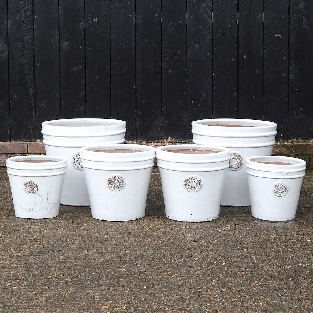 Lot 452 Three pairs of cream glazed garden pots