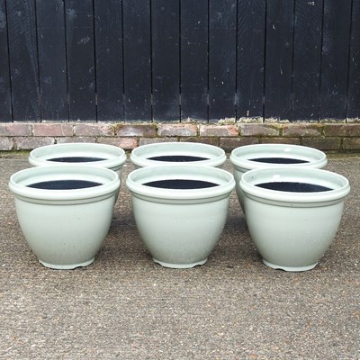 Lot 730 - A set of plastic garden pots