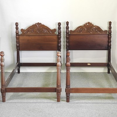 Lot 679 - A pair of Jamaican hand made carved hardwood single bedsteads