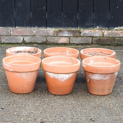 Lot 612 - A set of six terracotta garden pots