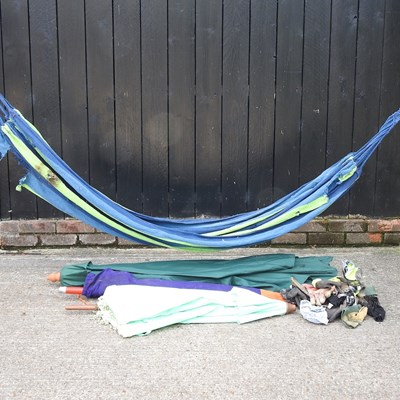 Lot 629 - A garden parasol, another and a hammock