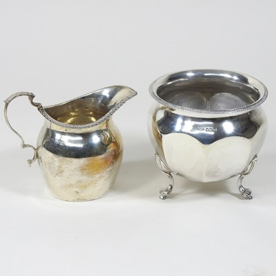 Lot 194 - A silver cream jug and sugar bowl