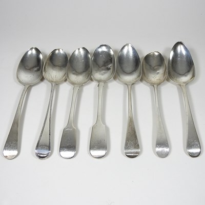 Lot 135 - Seven George III silver table spoons