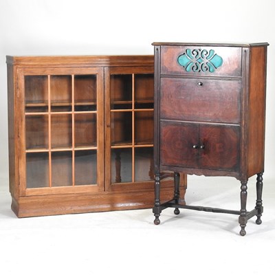 Lot 873 - A bookcase and cabinet