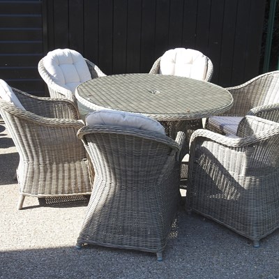 Lot 932 - A garden table and chairs