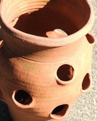 Lot 811 - A terracotta strawberry pot