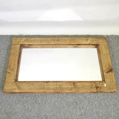 Lot 461 - A rustic wooden framed wall mirror