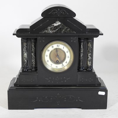 Lot 559 - A Victorian black slate mantel clock