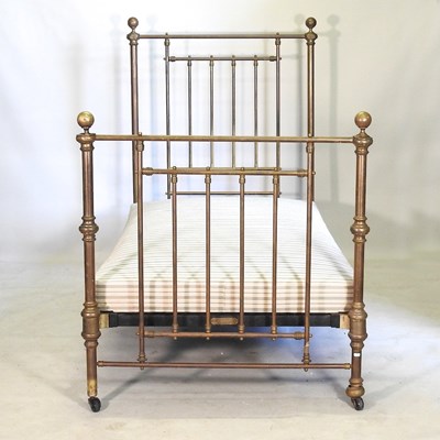 Lot 511 - A Victorian brass bedstead