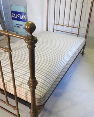 Lot 511 - A Victorian brass bedstead