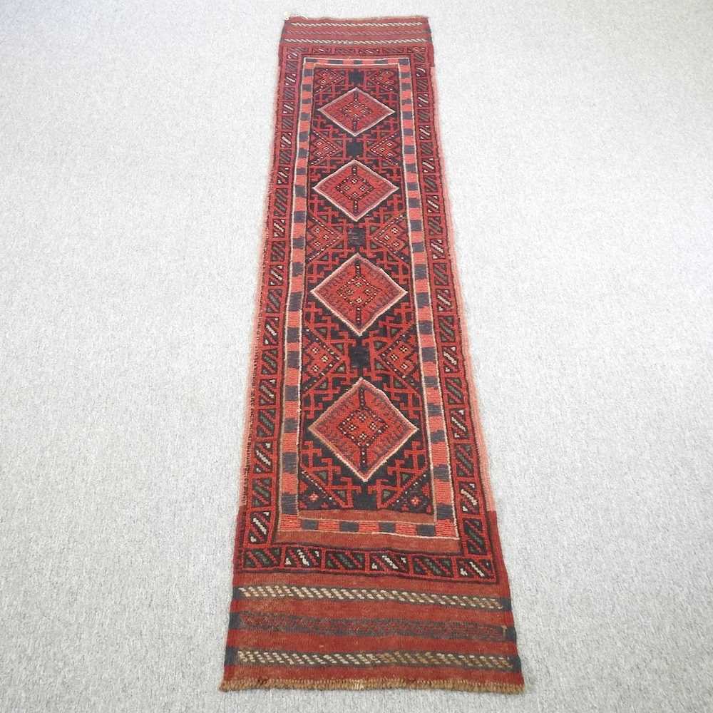 Lot 240 - A Persian runner