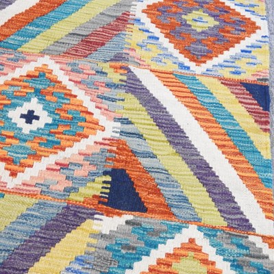 Lot 633 - A kilim runner