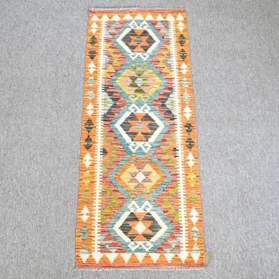 Lot 623 - A kilim runner