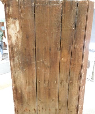 Lot 592 - An antique pine corner cupboard