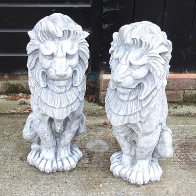 Lot 27 - A pair of cast stone lions