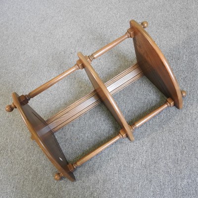 Lot 396 - An Ercol corner shelf