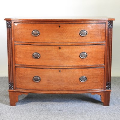 Lot 294 - A 19th century bow front chest