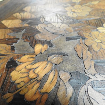 Lot 88 - A French marquetry occasional table