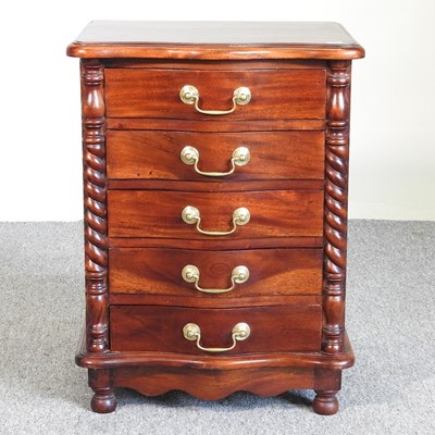 Lot 588 - A serpentine chest