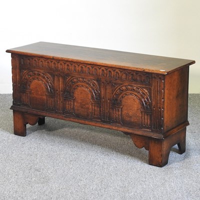 Lot 623 - A carved oak coffer