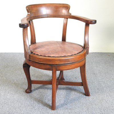 Lot 546 - A revolving desk chair