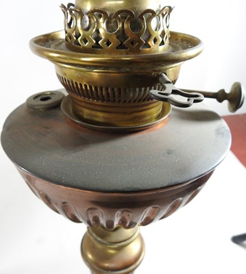 Lot 438 - Three various oil lamp bases