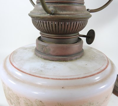 Lot 438 - Three various oil lamp bases