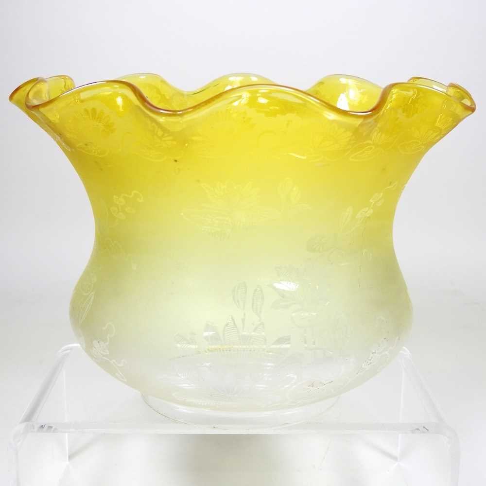 Lot 295 - A yellow etched glass oil lamp shade