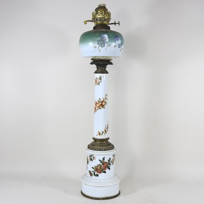 Lot 326 - A porcelain oil lamp, with floral decoration