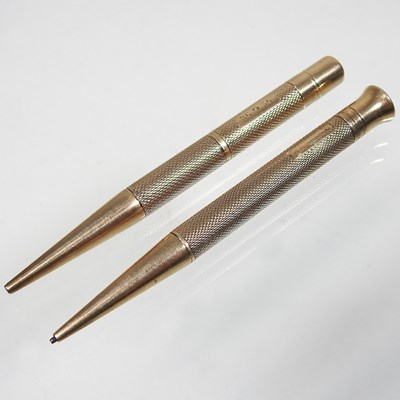 Lot 114 - Two 9 carat gold pencils