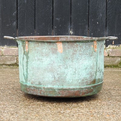 Lot 11 - A large copper, of circular riveted shape,...