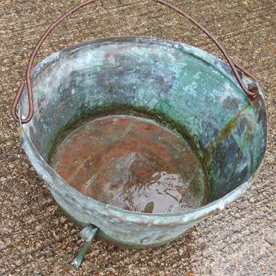 Lot 49 - A copper cauldron