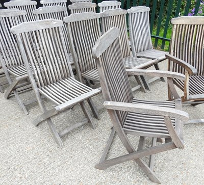 Lot 149 - A set of twelve teak garden chairs and two others