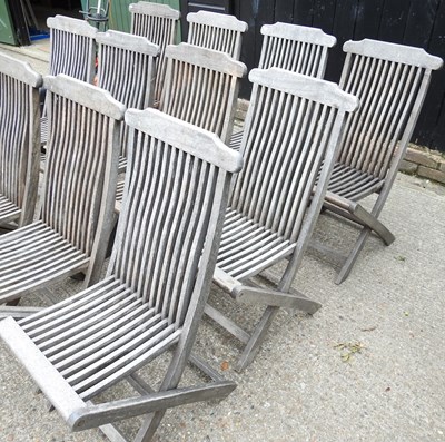 Lot 149 - A set of twelve teak garden chairs and two others
