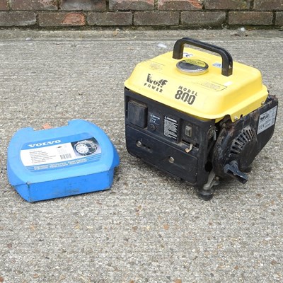 Lot 651 - A petrol generator and snow chains