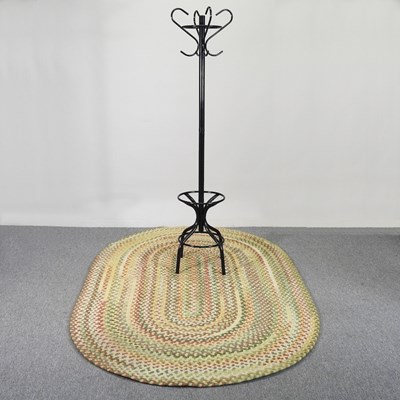 Lot 340 - A hat stand and rug