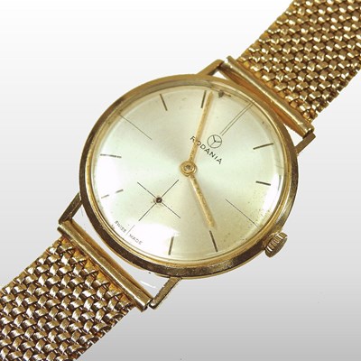 Lot 64 - A Rodania vintage gold wristwatch