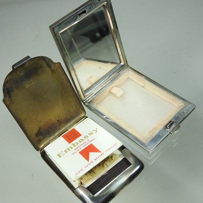 Lot 106 - An Art Deco silver compact and vesta case