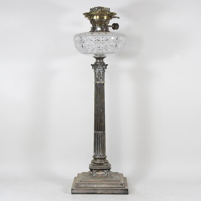 Lot 521 - A 19th century silver plated oil lamp