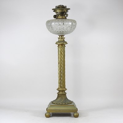 Lot 597 - A 19th century brass oil lamp