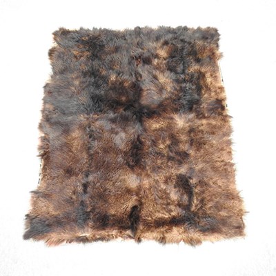 Lot 305 - A brown bear skin rug