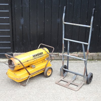 Lot 714 - A sack barrow and a paraffin heater