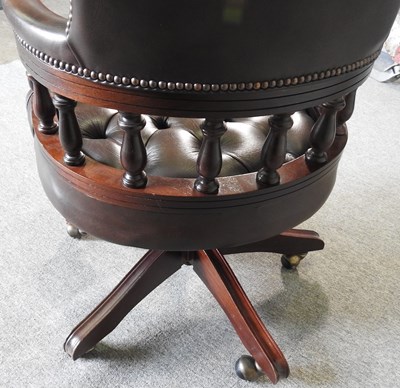 Lot 37 - A swivel desk chair
